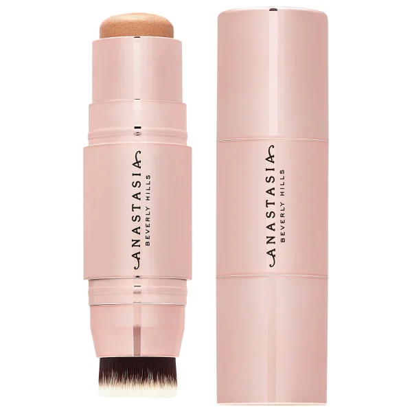 Anastasia Beverly Hills  Cream Stick Highlighter with Brush Applicator dripping in gold